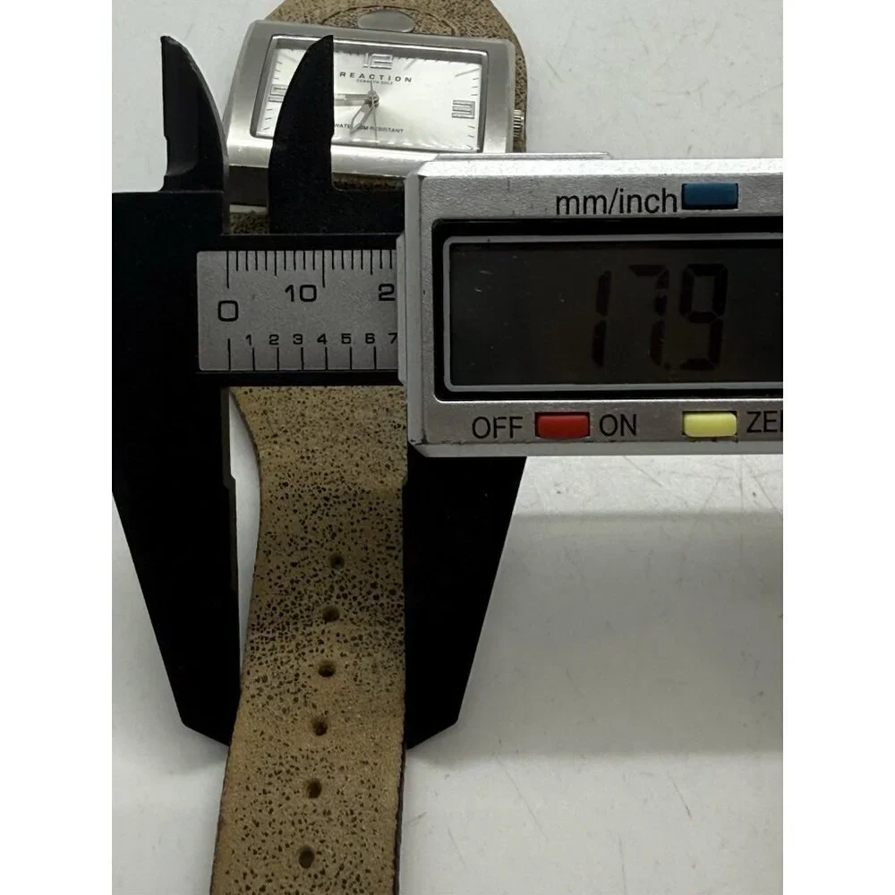 Reaction Kenneth Cole Watch Women's Silver Tone Rectangle Leather Wide Cuff Band